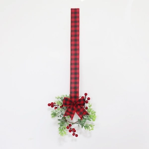 Buffalo plaid staircase garland with bow and frosted eucalyptus berries decor