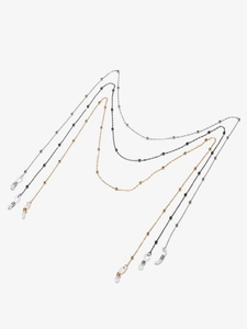 Lot de trois chaînes à lunettes en métal doré, argenté et noir avec petites perles