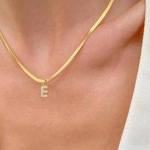 Gold snake chain necklace with sparkling cubic zirconia letter E pendant for women