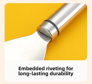 Detail of stainless steel corn peeler with secure embedded rivet joint for durability