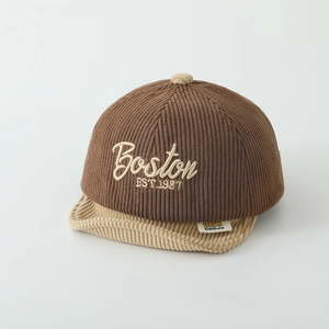 Close-up of Boston EST.1987 embroidery on brown and beige corduroy kids baseball cap