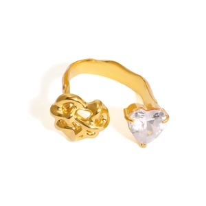 Golden stainless steel open ring with lava texture and sparkling heart-shaped zircon stone