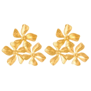 Detail of gold flower stud earrings with three petals and textured metal finish