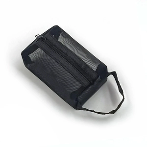 Mini black mesh organizer pouch with metal zipper and handle on a white background