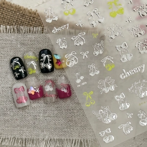 3D metallic cherry and bow nail art stickers with silver and neon yellow accents