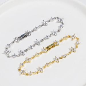 Elegant gold and silver four-leaf clover flower bracelets with sparkling zircon stones