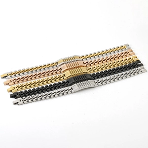 Detail view of five-link stainless steel watch bracelets in silver, gold, and rose gold finishes