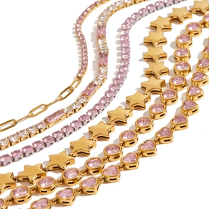 Luxurious gold and silver bracelets with pink heart zircon and multiple geometric charms
