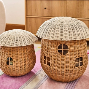 Set of two Nordic mushroom rattan storage baskets with lids in a cozy home setting