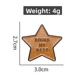 Detail showing orange star enamel pin with Doing My Best text and 3.0cm x 2.7cm size specs