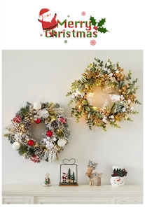 Detail of Christmas wreaths with pine needles, berries, and warm LED light strings on wall