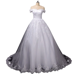 Elegant white off-the-shoulder lace wedding dress with a dreamy long train and beading