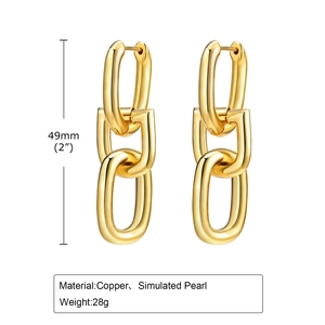 Detail view of gold chain earrings with pearls including size 49mm and material specs
