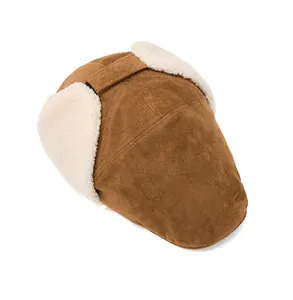 Top view of brown suede winter beret hat with thick faux fleece lining and ear flaps