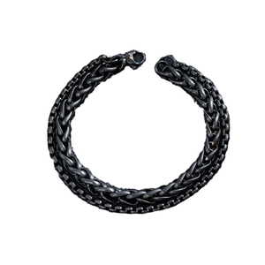 Close-up of black stainless steel woven chain bracelet with lobster clasp