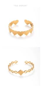 Detail of gold-plated stainless steel heart and geometric hollow wide cuff bangles