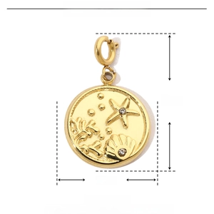 Detailed macro view of gold stainless steel ocean pendant with shell and starfish charms