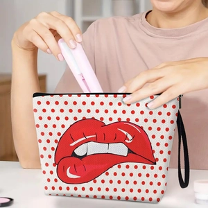 Trousse à maquillage en toile à pois avec motif lèvres et dragonne pour voyage