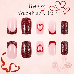 Short square press-on nails set in glossy red and pink with heart designs for Valentine