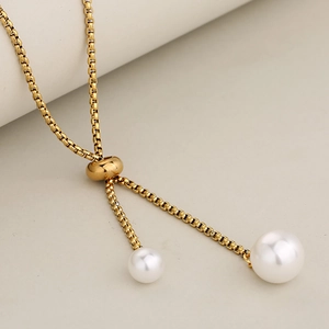 Adjustable gold pearl necklace with sliding bead clasp and minimalist drop design