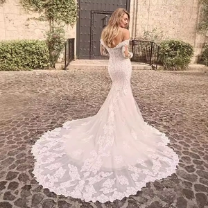 Off-shoulder lace mermaid wedding dress with long sleeves and elegant long train