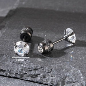 Detailed view of 6mm black stainless steel stud earrings with round cubic zirconia stones
