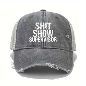 Close-up of distressed brim and mesh detail on Shit Show Supervisor trucker hat