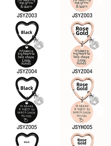 Detailed view of heart-shaped keyrings with apple charm and engraved gratitude tags