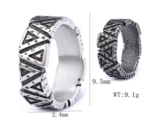 Detail showing 9.5mm width and 2.4mm thickness of the silver textured metal ring