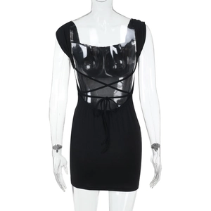 Close-up detail of the crisscross back lace-up design on the black bodycon dress