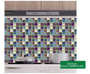 Detail of colorful gradient mosaic tile stickers applied on a kitchen backsplash wall