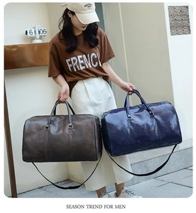 Bolsas de viaje grandes de cuero PU en colores café oscuro y azul profundo al aire