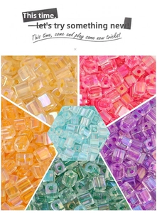 Macro shot of 5mm colorful iridescent square glass beads with center holes for DIY crafts