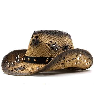 Western style straw cowboy hat with gradient woven design and metal studded leather band