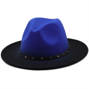 Detail of blue and black wool felt fedora featuring a studded band and wide brim