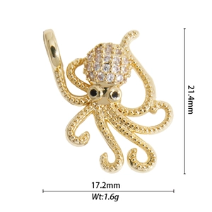 Detailed macro view of gold octopus pendant with cubic zirconia, size 21.4mm by 17.2mm
