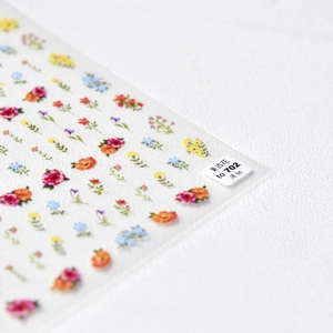 Japanese style retro floral nail stickers featuring colorful small flower patterns for DIY art