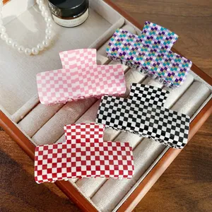 Fashion checkered acrylic hair claws in multiple colors including pink and black patterns