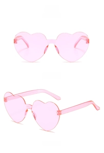 Front and side views of translucent pink heart-shaped rimless sunglasses for women