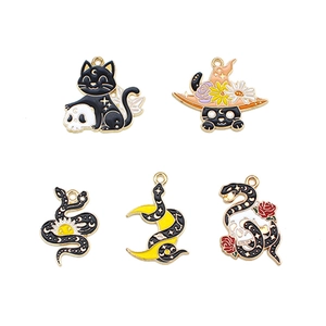 Gothic DIY charms set with black cats, snakes, moon, and skulls for jewelry making