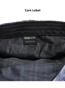 Macro detail of breathable mesh lining and 100% cotton care label on striped beret hat