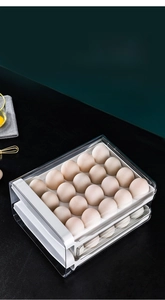 Close-up of double-layer transparent 32-grid egg storage box with sliding drawer design