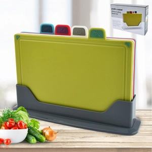 Detailed view of 4-piece color-coded cutting boards with non-slip base and retail box