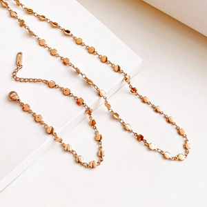 Elegant rose gold stainless steel necklace with small floral segments and lobster clasp