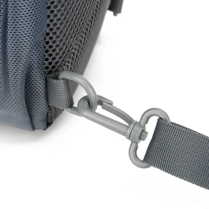 Macro detail of breathable mesh fabric and durable plastic swivel hook on nylon waist bag