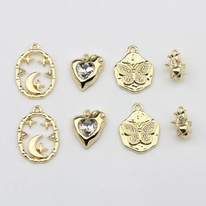 Golden alloy DIY charms set with heart, butterfly, moon and star crystal pendants