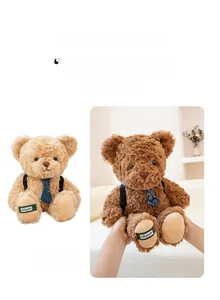 Close-up of curly lamb velvet teddy bear plush toys with embroidered foot details and ties