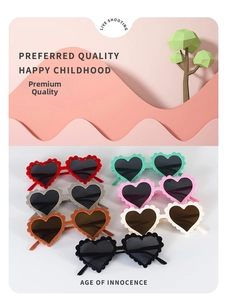 Macro view of wave-edge heart-shaped children's sunglasses in seven assorted colors