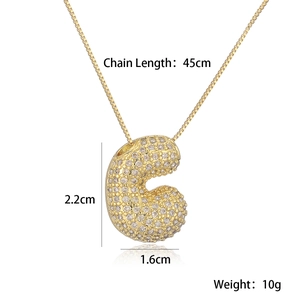 Detail view of gold letter C pendant with dimensions 2.2cm x 1.6cm and 45cm chain