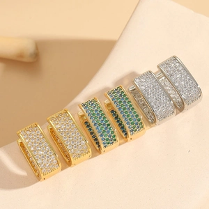 Three pairs of rectangular pavé hoop earrings in gold and silver finish with colored zircon